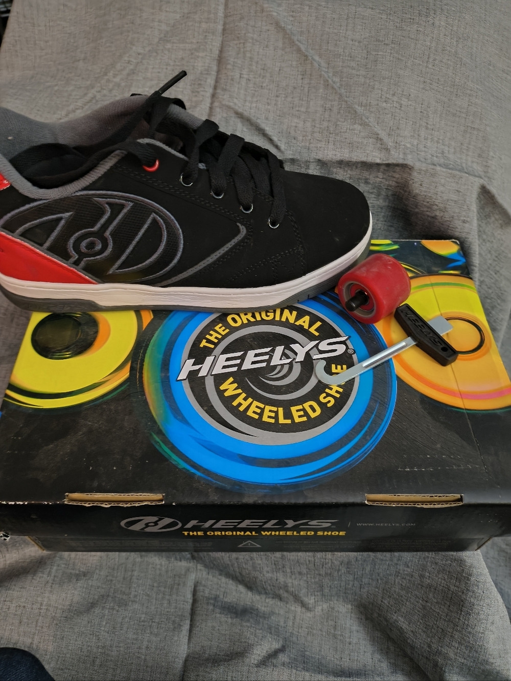 Heelys Black and Red Low-Top Wheeled Sneaker